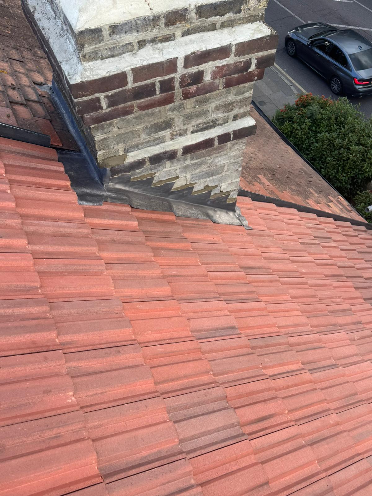 Lead flashing and detail work on a tiled roof